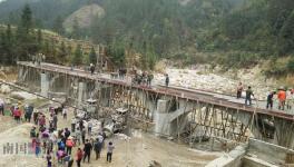 柳州鱼峰水泥送80吨水泥支持村民建大桥