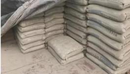 记者深夜暗访假水泥黑窝点 一举取缔假名牌