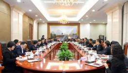 高登榜会见周龙山 海螺与华润水泥或将延伸合作领域