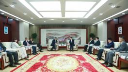 周育先会见霍尼韦尔全球董事长兼首席执行官柯伟茂一行